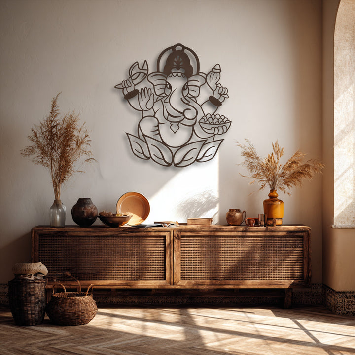 The visual rhythm of the sacred elephant deity Ganesha metal wall decor, with intricate lines and surrounding dried botanicals, creates a serene ambiance.