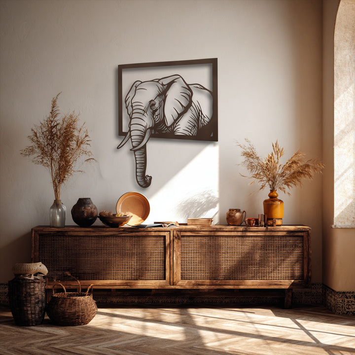 A textured light beige wall beautifully frames an emerging elephant metal art for wall, casting shadows and highlighting the unique decor.