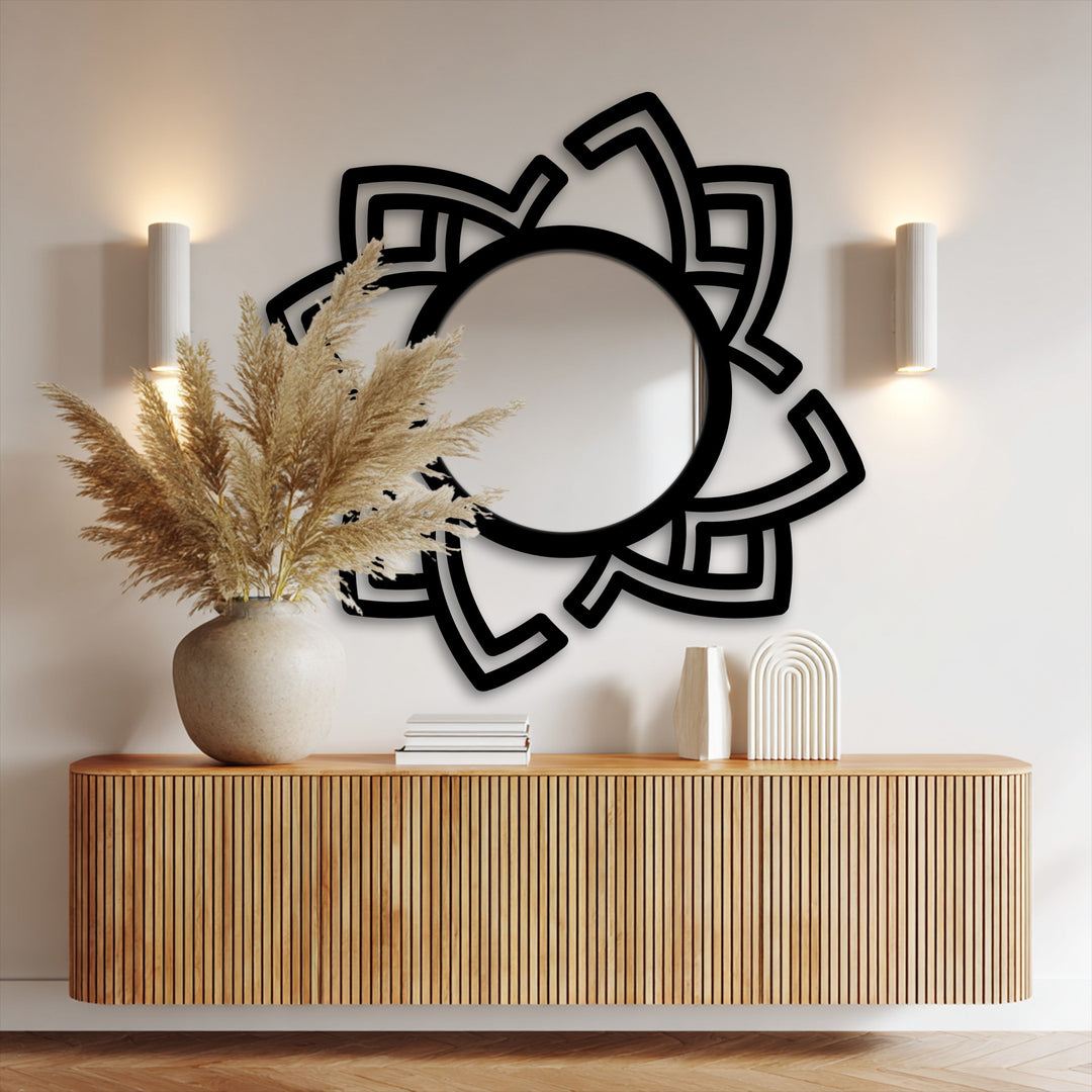 With muted color saturation, the modern mirror reflects a minimalist room setting, emphasizing the dynamic design of the abstract rotating metal artwork frame.