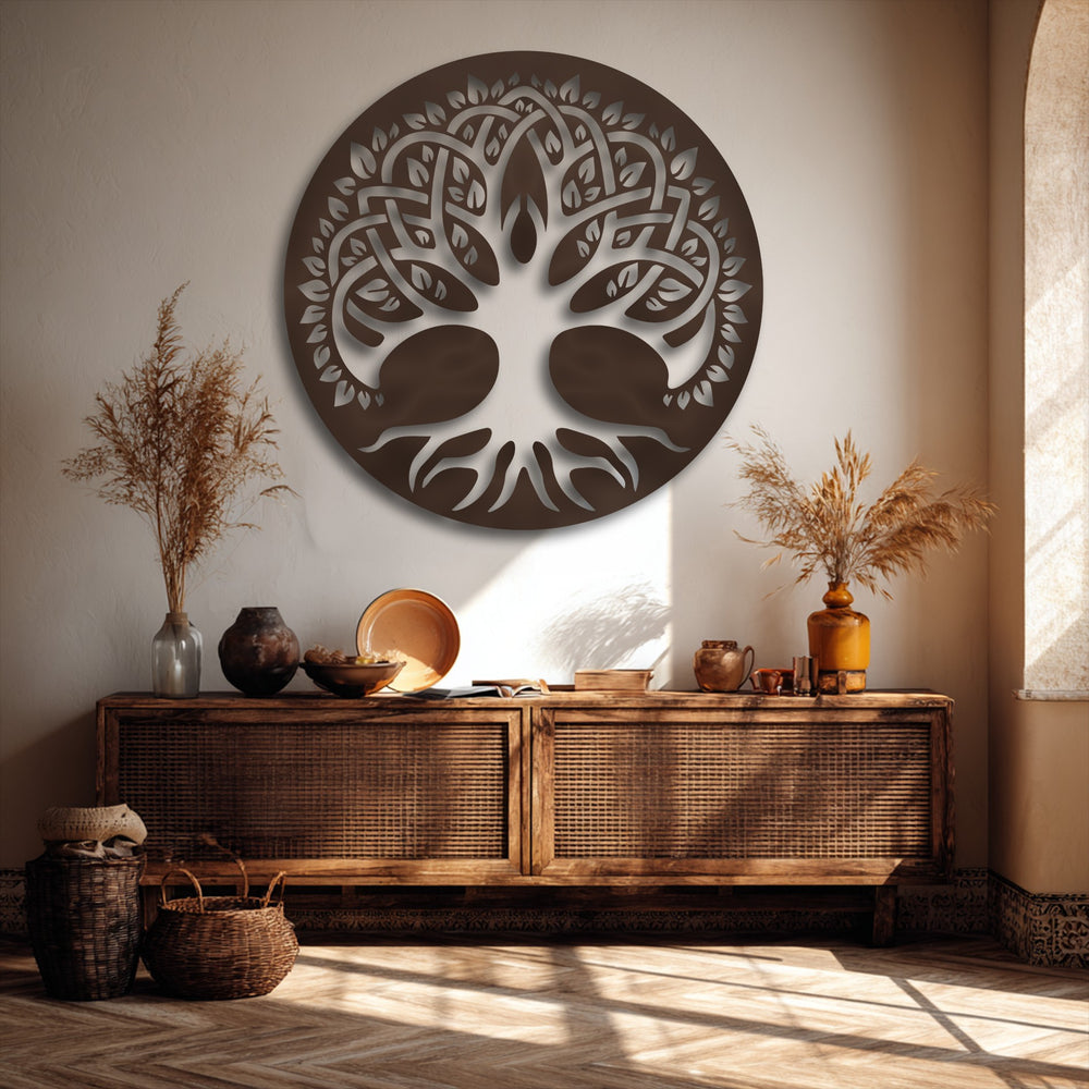 The stillness of a sunlit room highlights a detailed Celtic Tree of Life metal artwork above a rustic console table, adorned with dried botanicals.