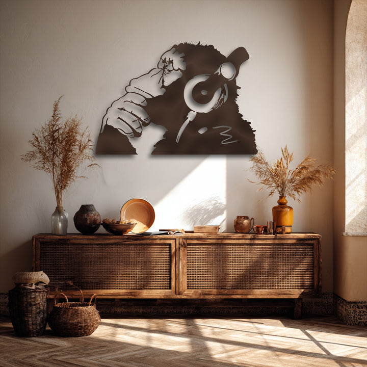 The stylish and modern mood created by the urban monkey headphones metal decoration wall art enhances the warm room's aesthetic.