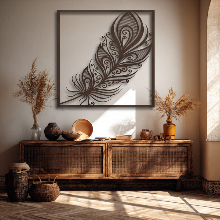 With understated color saturation, this ornate feather metal wall decor features elegant swirl plume details in a warm, earthy setting.