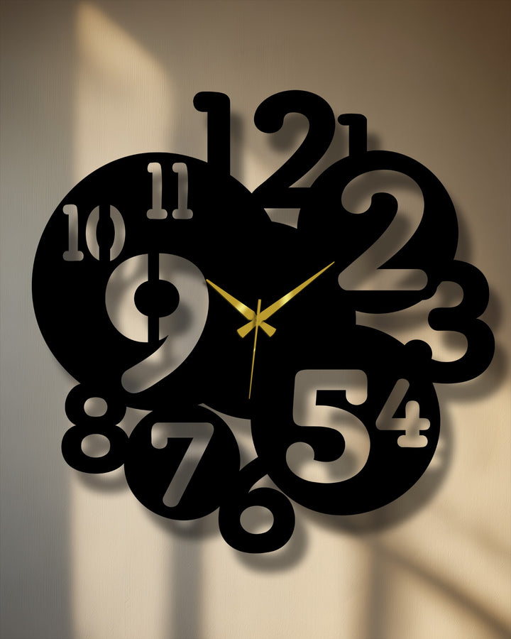 Overlapping black numbers form a circular pattern in this modern metal wall clock, offering a unique design that adds style to your metal wall decor.