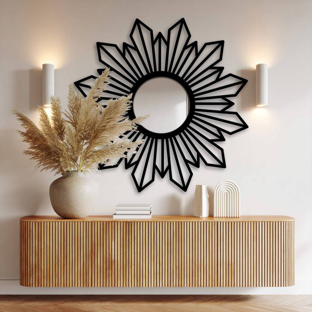 The focal point of this sunburst geometric design highlights the appeal of a modern mirror, making it a radiant and stylish decorative piece.