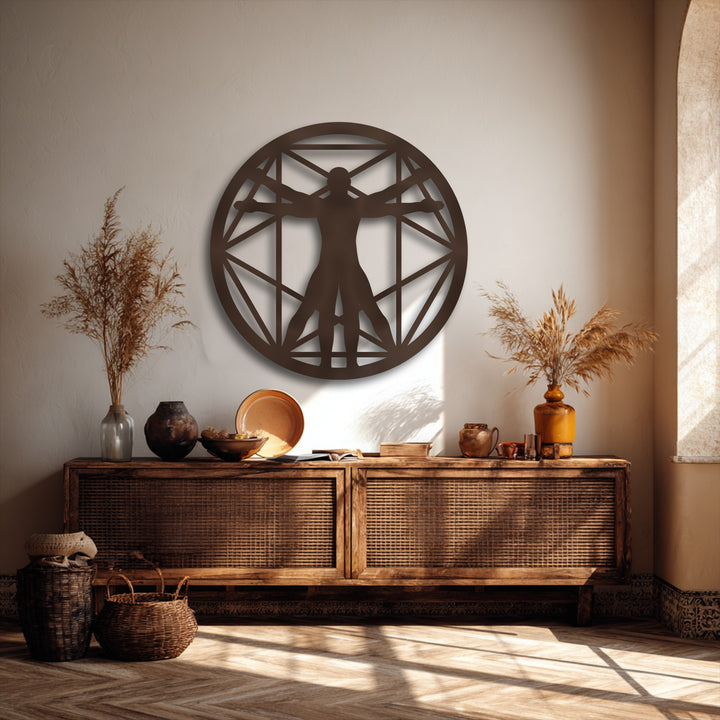 The unique metal wall art featuring the Vitruvian Man Geometric Circle stands out with its sharp color contrast against the light wall.