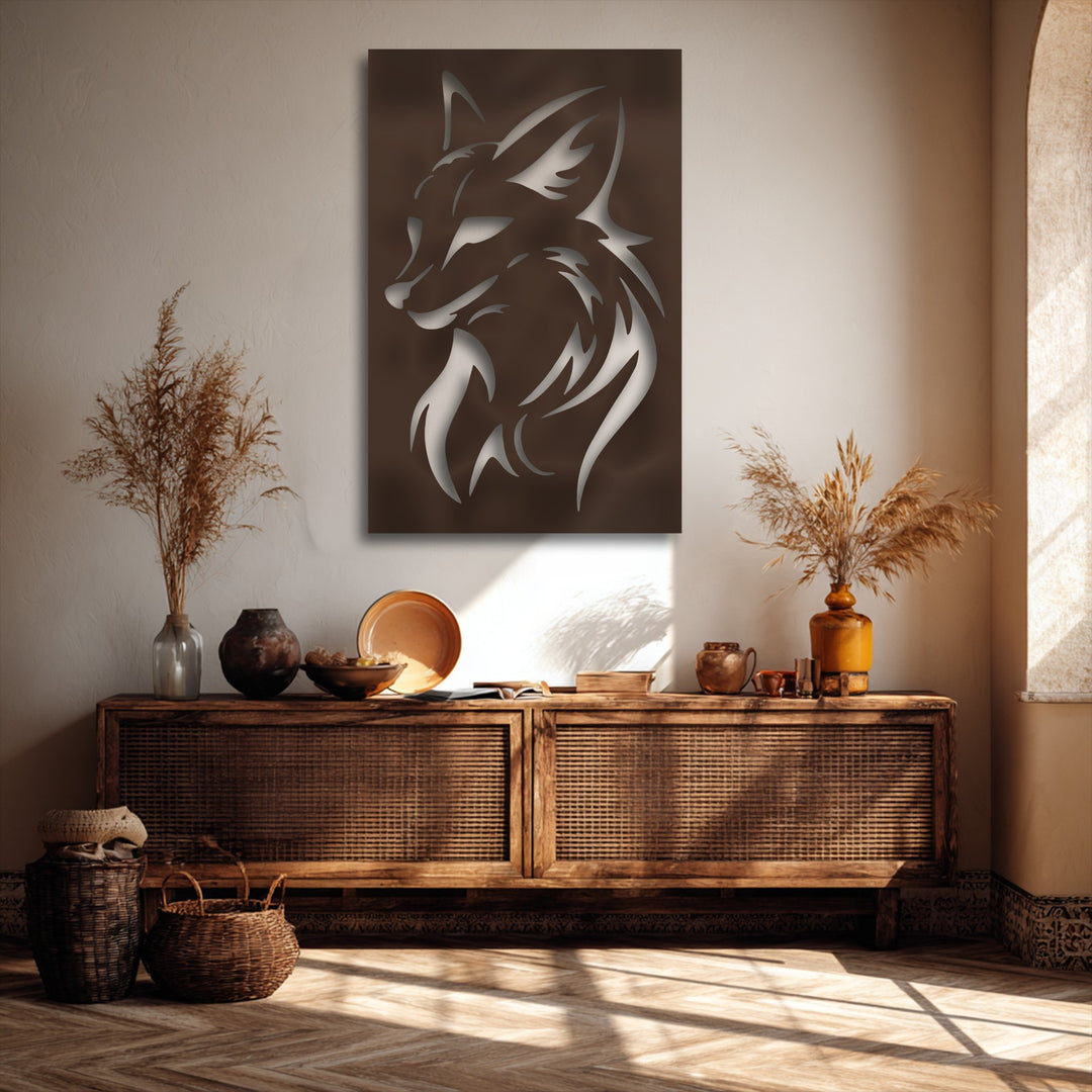A cozy, warm color temperature enhances the intricate decorative metal art of a fierce wolf head silhouette in an earthy-toned setting.