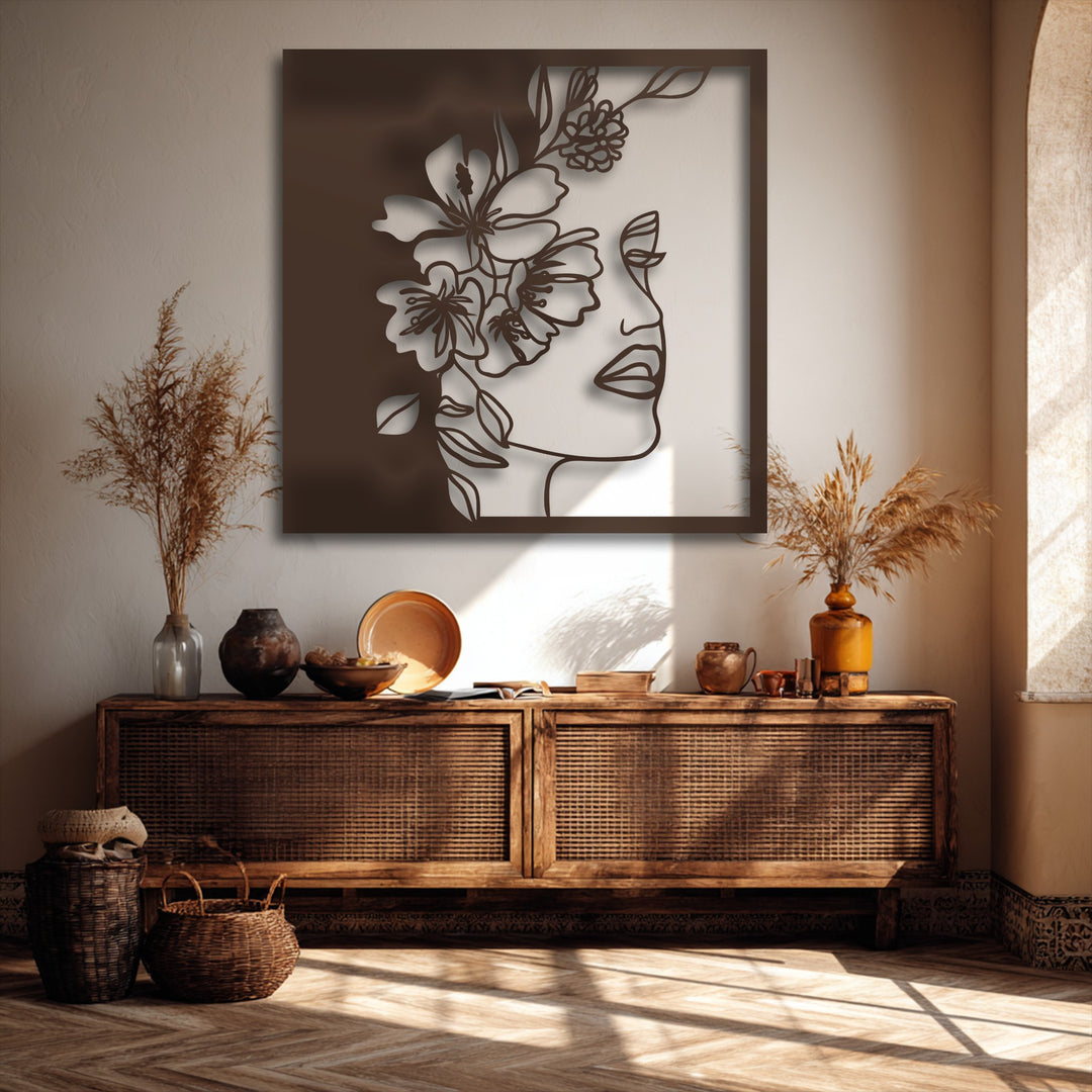 The tranquil stillness of the rustic room is beautifully captured, featuring an elegant floral woman line art as decorative metal art.