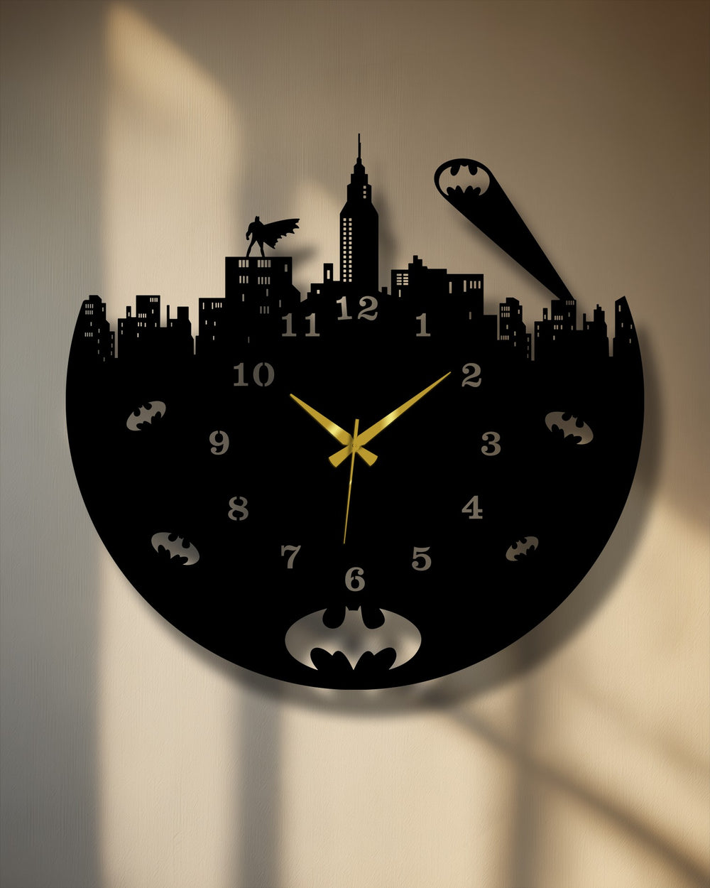The layered metal art for wall clock reveals depth through its intricate urban skyline, featuring a Batman silhouette and prominent wall shadows.