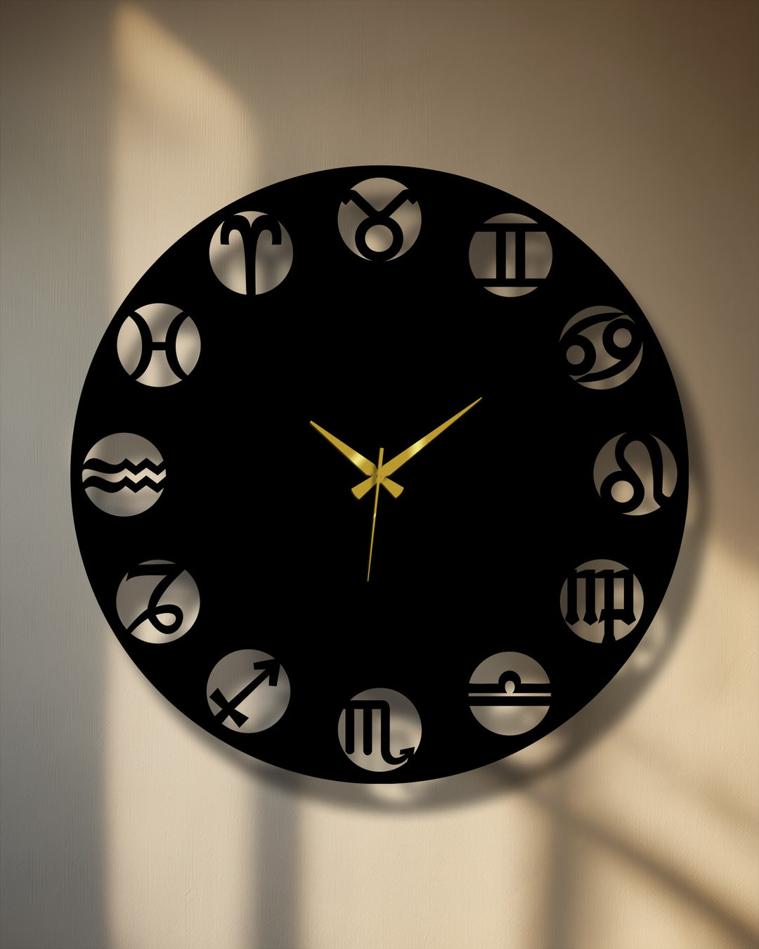 The crisp, circular edge and the borders around each cut-out zodiac symbol define this decorative metal art clock.