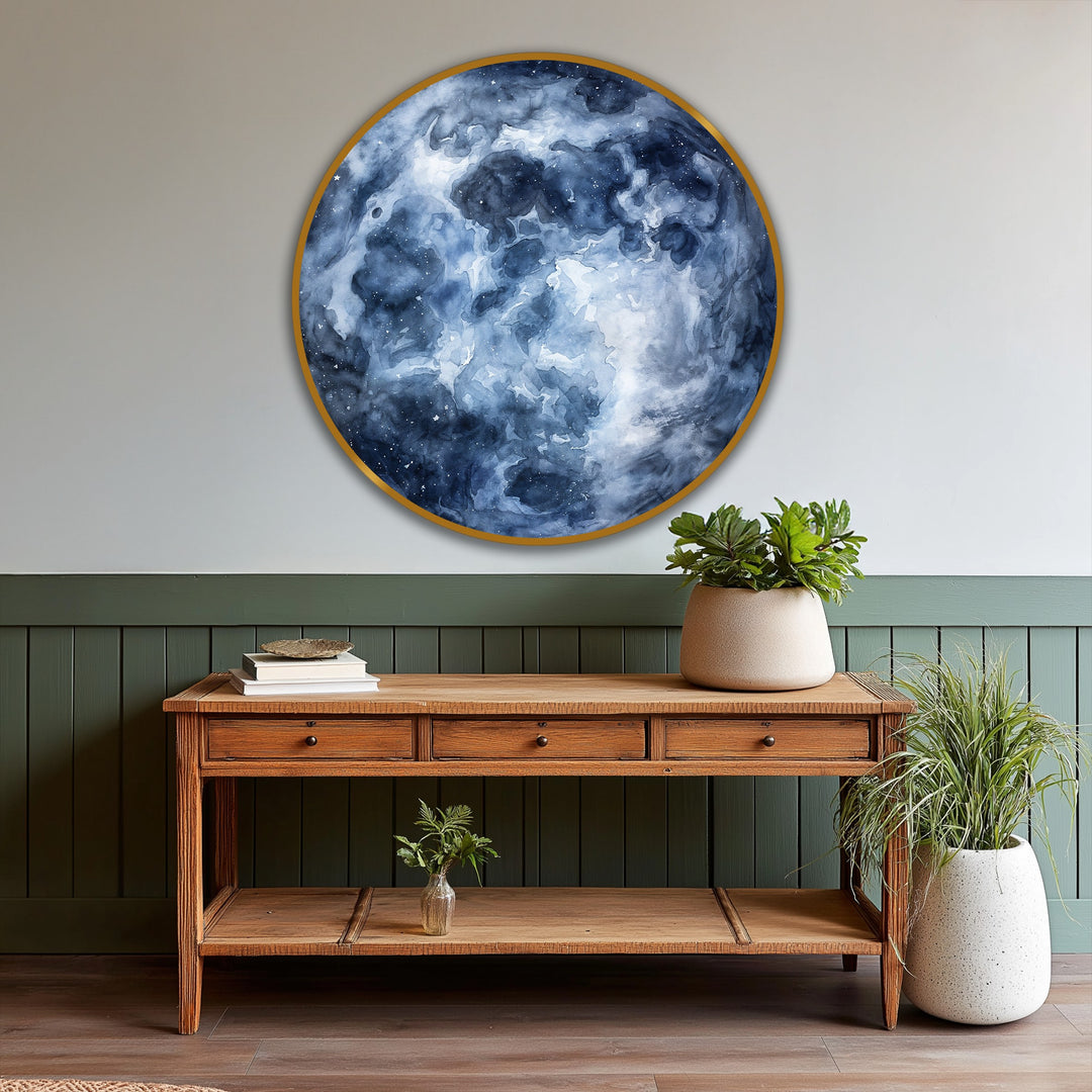 The two-tone background, with olive green wainscoting below and light gray above, offsets the round, deep blue abstract oil painting reproduction print.
