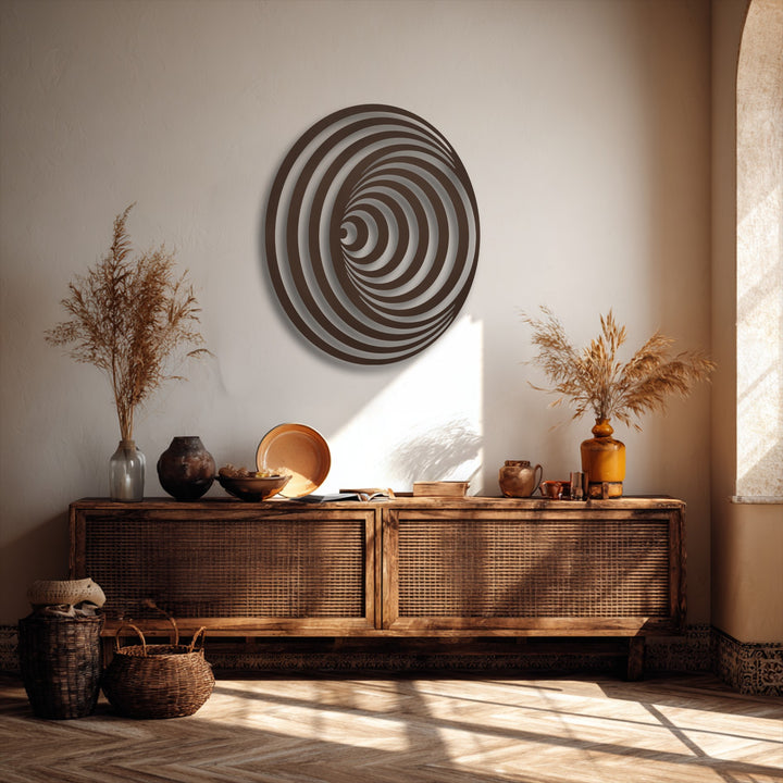 The intricate borders of the hypnotic spiral circle metal artwork create a captivating geometric illusion on the wall.