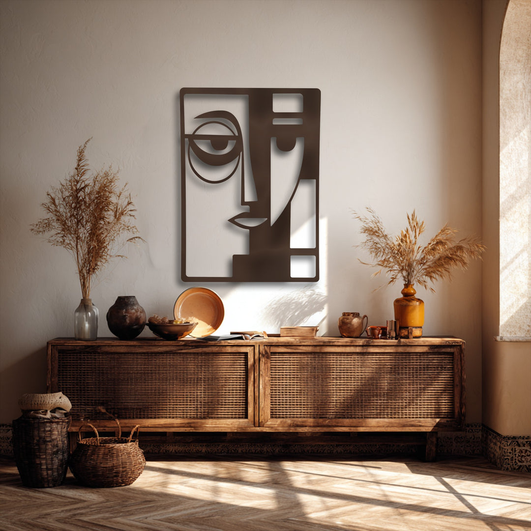 This durable dark bronze metal art for wall features an abstract geometric face with precision cut details, highlighting superior material quality.