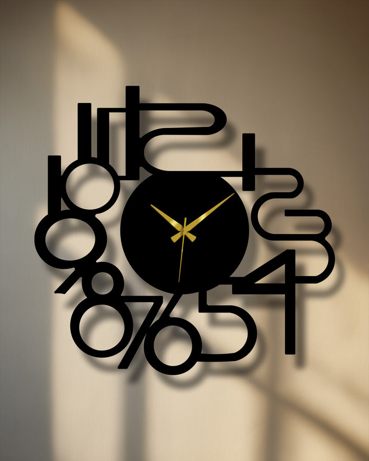 The darkest area, a sleek black clock face and bold abstract metal numbers, forms a striking modern metal wall decor piece with golden hands.