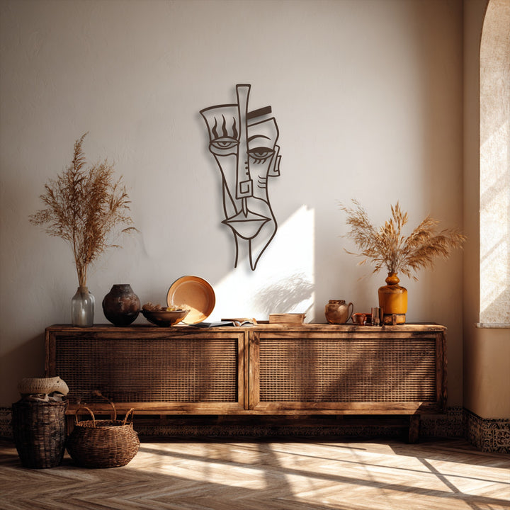 Textured beige walls provide a soft, neutral background for the abstract metal wall decor, with sunbeams highlighting the patterned floor.
