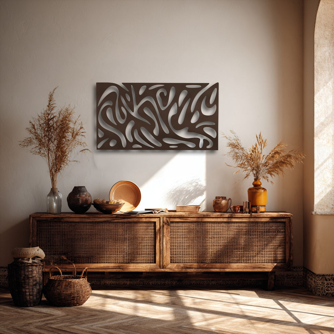The premium metal wall decor features a robust, deep brown finish, meticulously crafted into an abstract fluid pattern with distinct shadows.