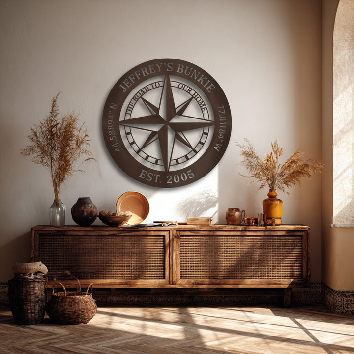 The earthy transition from the light wall to the deep bronze unique metal wall art highlights the personalized compass nautical decor.