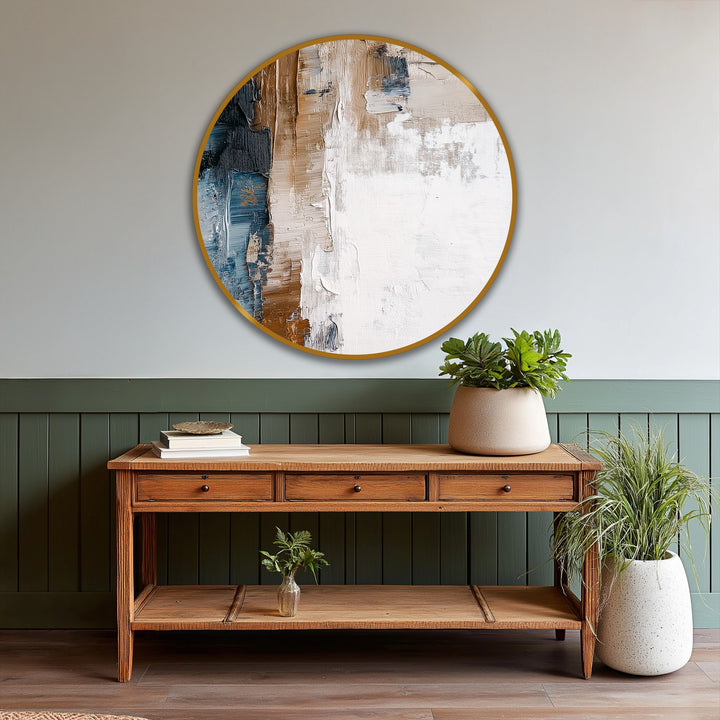 The darkest area of this textured abstract round oil painting showcases modern oil painting art with striking blue and brown hues in an earthy horizon scene.