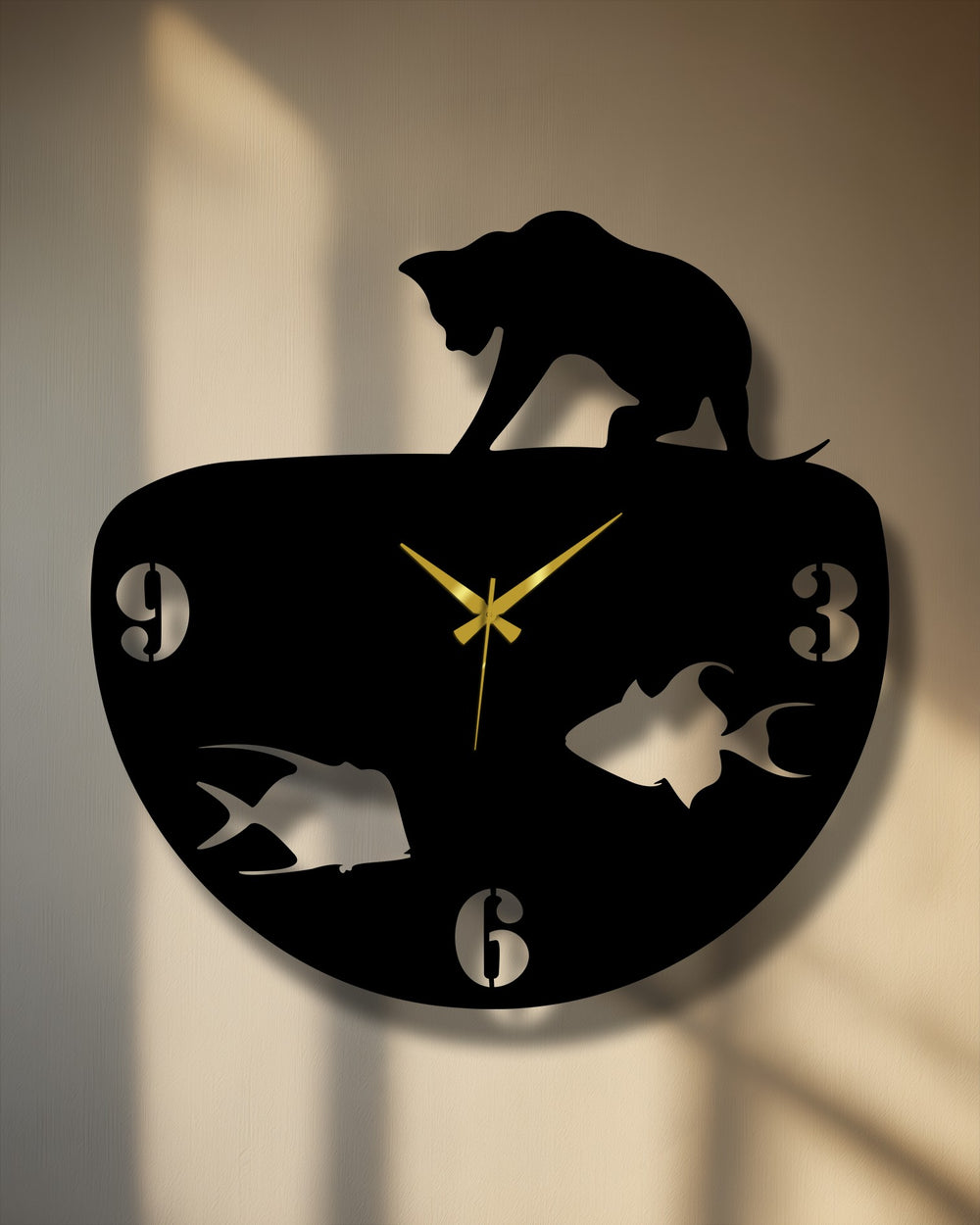 Sharp color contrast highlights a dramatic black cat and fish bowl metal art for wall clock against a bright, textured wall.