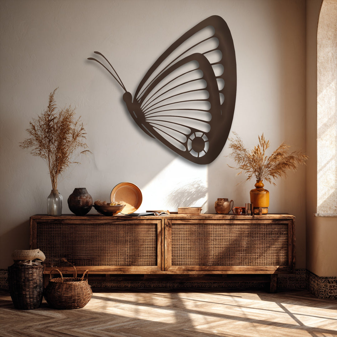The realistic detail of the elegant butterfly metal decoration wall art is striking, casting a lifelike shadow on the textured wall.