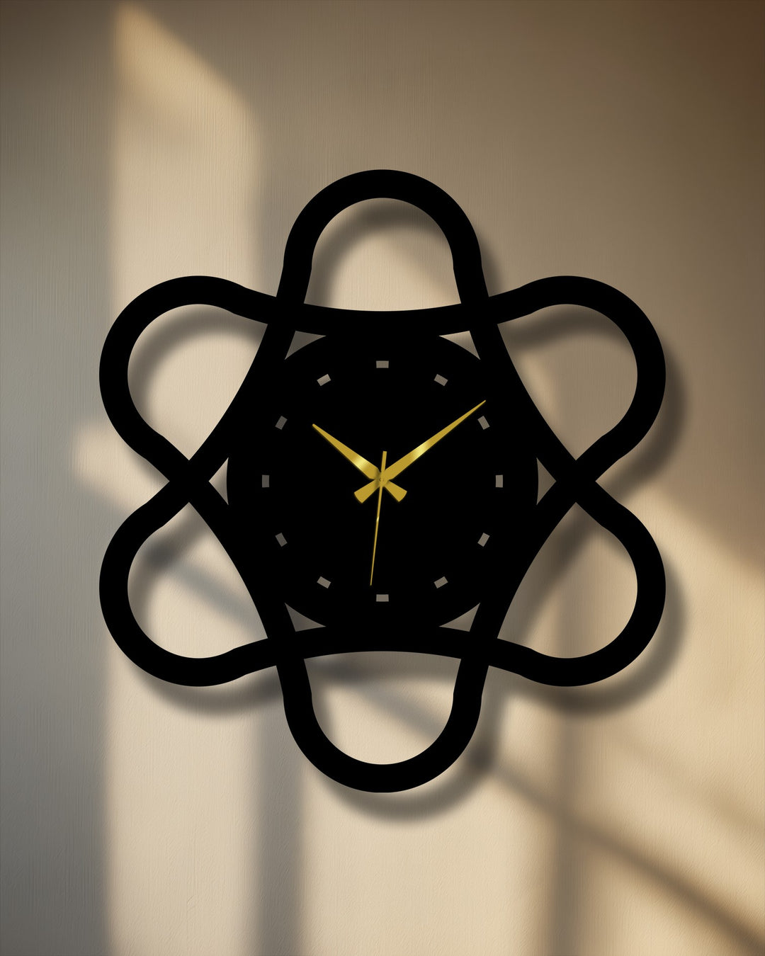 Subtle surface texture highlights the elegant, decoration wall art aesthetic of the minimal loop geometry metal wall clock's matte black finish and looping design.