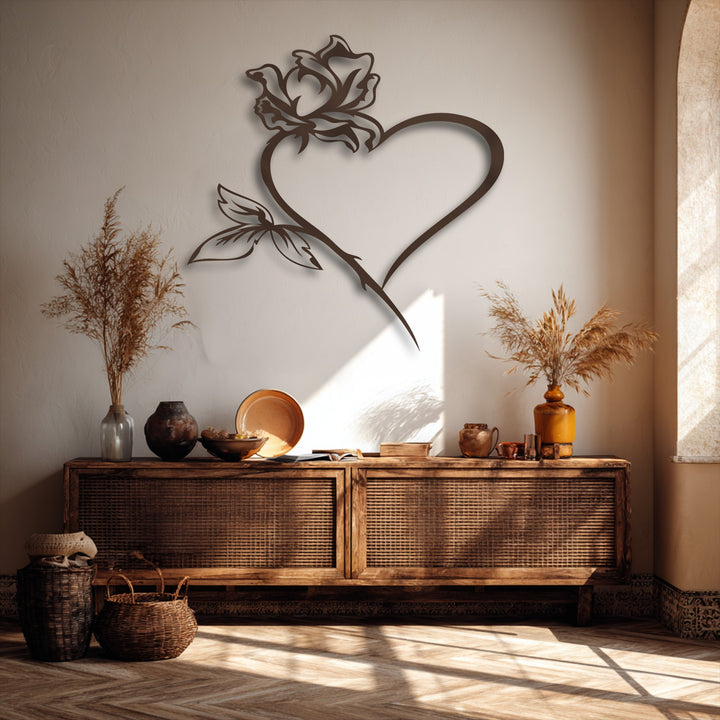 The intricate metal rose heart wall decor creates a dynamic layering effect with its subtle shadow against the light wall.