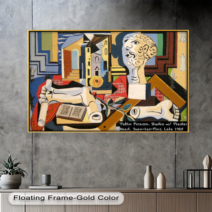 Cubist studio scene featuring a classical plaster bust, books, and geometric architectural elements in vivid, abstract shapes.