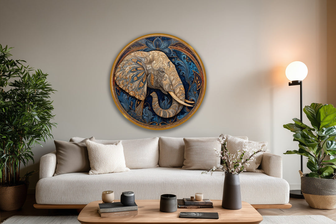 Dominantly indigo, the oil painting wall art depicts a round oil painting of an elephant with ornate detailing and a golden frame, offering a luxurious accent piece.