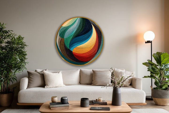 The chromatic flow of this round, modern abstract oil painting wall art beautifully showcases the transition between vibrant green, blue, and red tones.