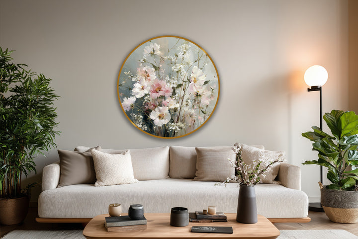 Negative space surrounds the round oil painting art piece, highlighting the elegant, soft pastel wildflowers in bloom with their delicate floral details.