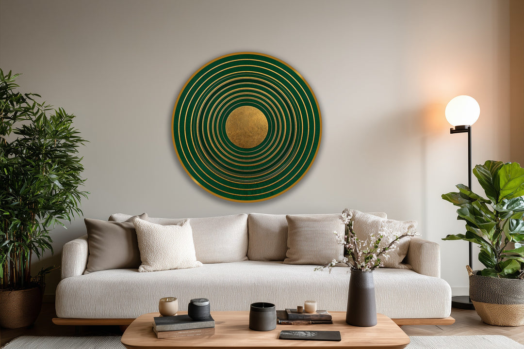 Negative space highlights the concentric arrangement of rings in this emerald and gold round oil painting artwork, giving it a sense of depth.