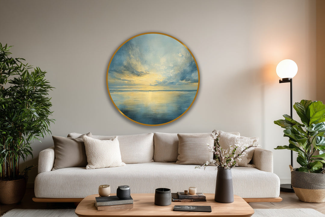 Highlighting the layering effect, the Golden Stillness round oil painting art piece displays a serene coastal horizon with masterful brushstrokes and golden reflections.