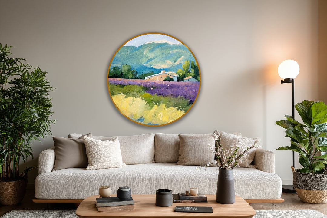 Illuminated by bright light, this oil painting artwork shows a round landscape featuring a lavender field, farmhouse, and mountains in Provence, bringing nature into the room.