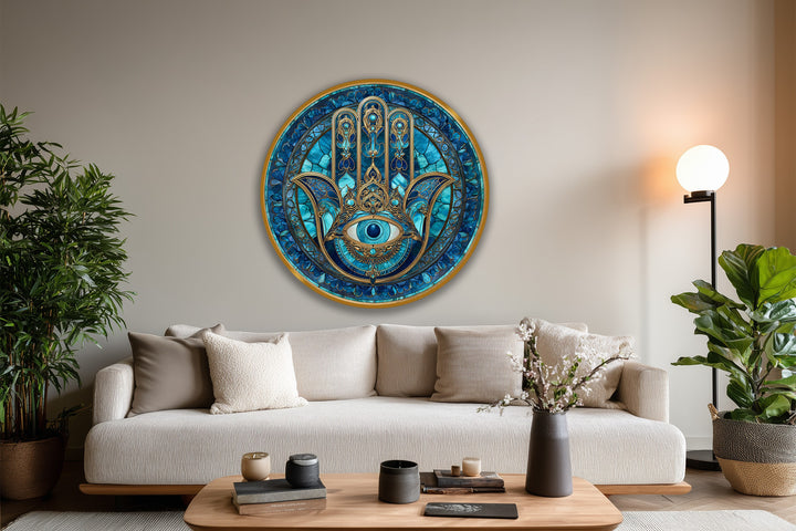 Round protective eye oil painting art prints of a blue Nazar Hamsa with gold details radiates spiritual energy as the central subject on wood.
