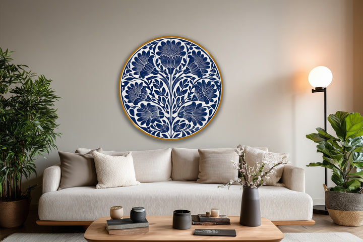 The sofa's fluffy throw pillow showcases the room's softest element beside a floral Indigo Motif Round oil painting decoration, enhancing this comfortable interior.