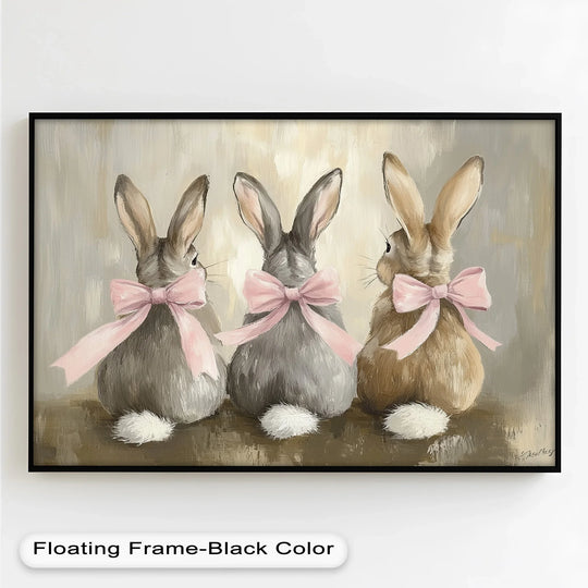 Neutral negative space highlights a trio of charming bunnies with pink bows, an animal-themed oil painting decoration bringing sweetness to any space.