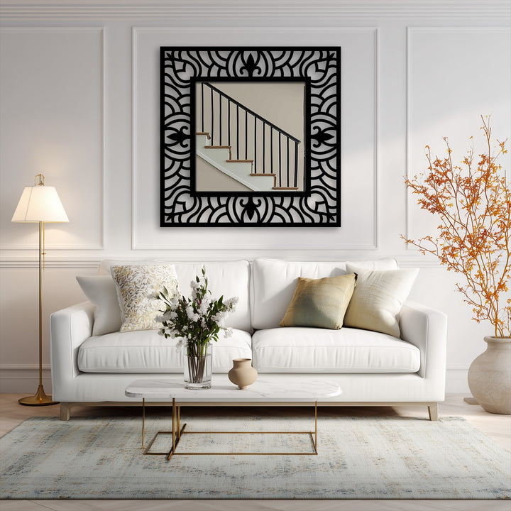 Crisp white wainscoting serves as a clean background for the ornate, wave pattern square floor mirror, a sophisticated example of metal artwork enhancing the room.