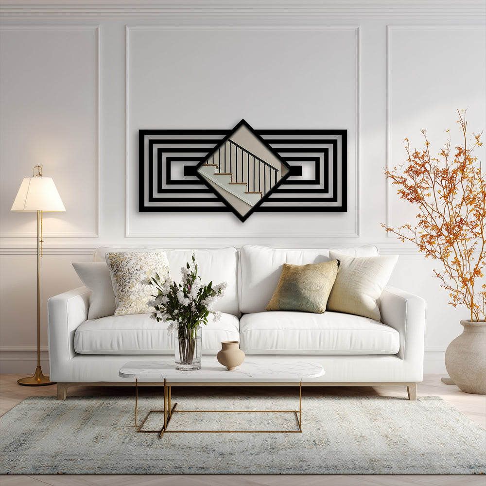 Flowing floral arrangement and branches soften the geometric lines of the art deco decorative mirror, lending organic beauty to the modern interior.