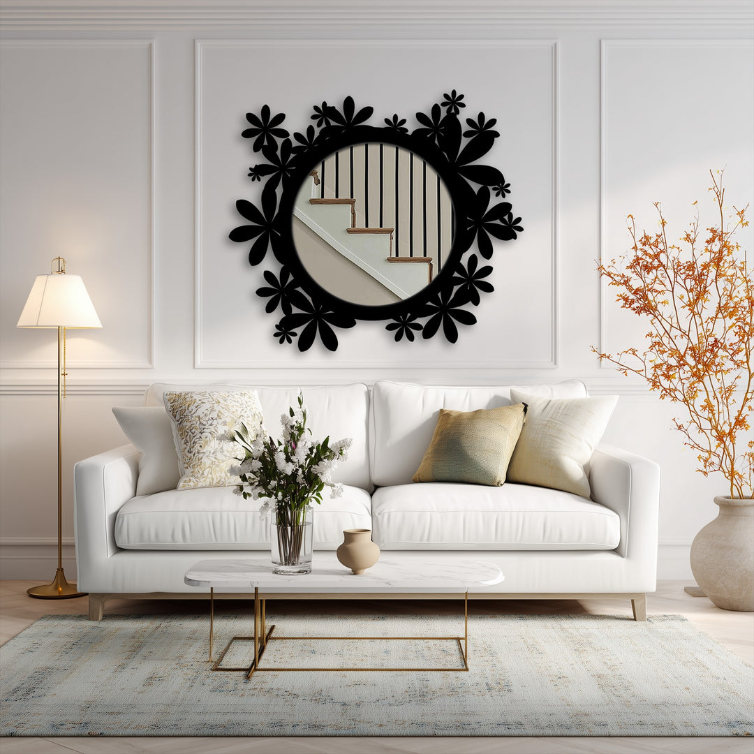Framed by paneled white walls, the Bloom Halo floor mirror showcases a black metal floral frame, enhancing its design and adding depth through unique metal wall art.
