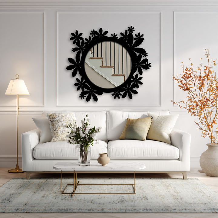 Framed by paneled white walls, the Bloom Halo floor mirror showcases a black metal floral frame, enhancing its design and adding depth through unique metal wall art.