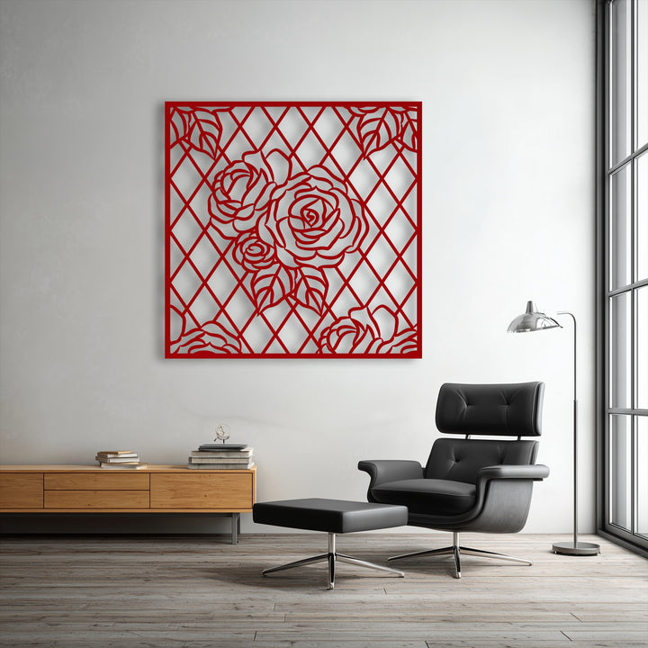 The organic forms of intricate red roses and leaves stand out in this captivating metal wall decor, featuring a striking geometric lattice design.