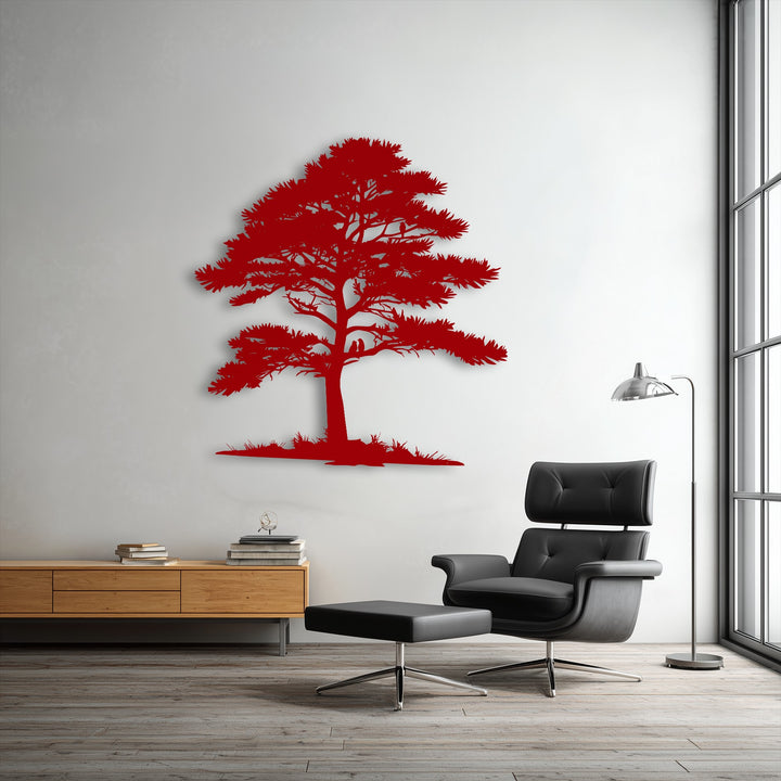 Subtle shadows play behind the bold red tree silhouette, enhancing the depth of this unique metal wall art.