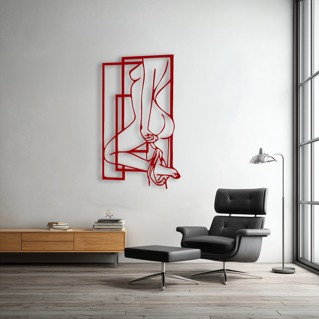 The room's cool color temperature is strikingly contrasted by the vibrant red unique metal wall art depicting an abstract feminine silhouette.