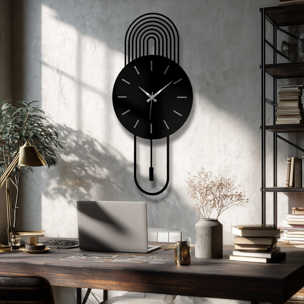 Vertical modern arc metal wall clock in an oval shape presents a unique metal wall art piece with a minimalist pendulum design.