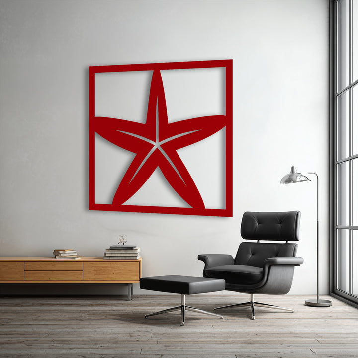 A comfortable black leather lounge chair and ottoman rest on light wood flooring, offering a cozy spot to admire the unique metal wall art starfish frame.