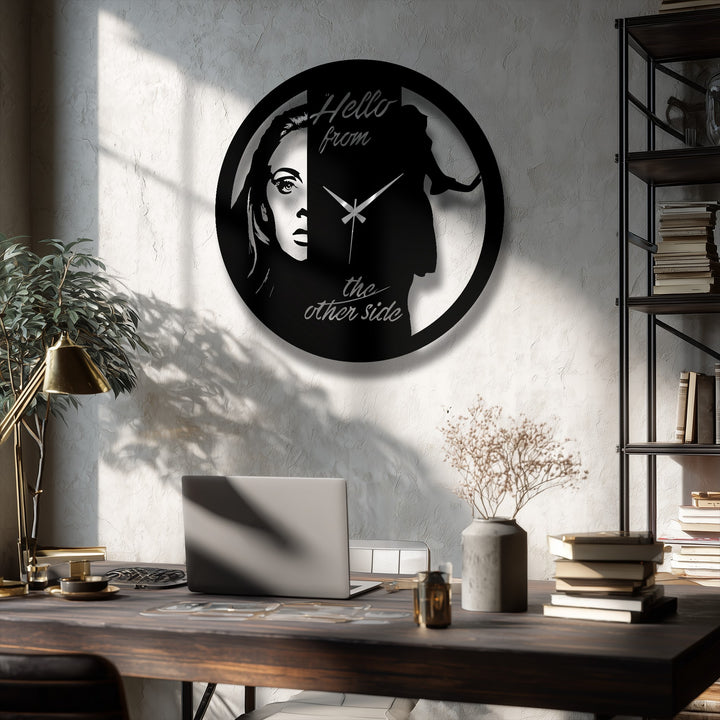 Featuring a modern, low color temperature, this decorative metal art clock presents an artistic dual-face portrait design, blending contrasting warm and cool tones.