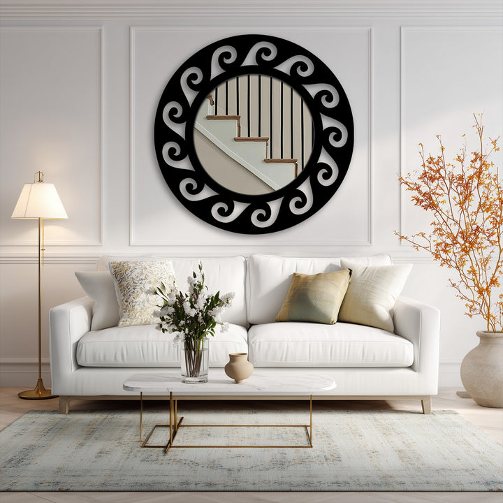 The repeated scroll pattern of the black metal frame creates a dynamic visual rhythm around the modern mirror, enhancing the elegant design of the ornate round floor mirror.