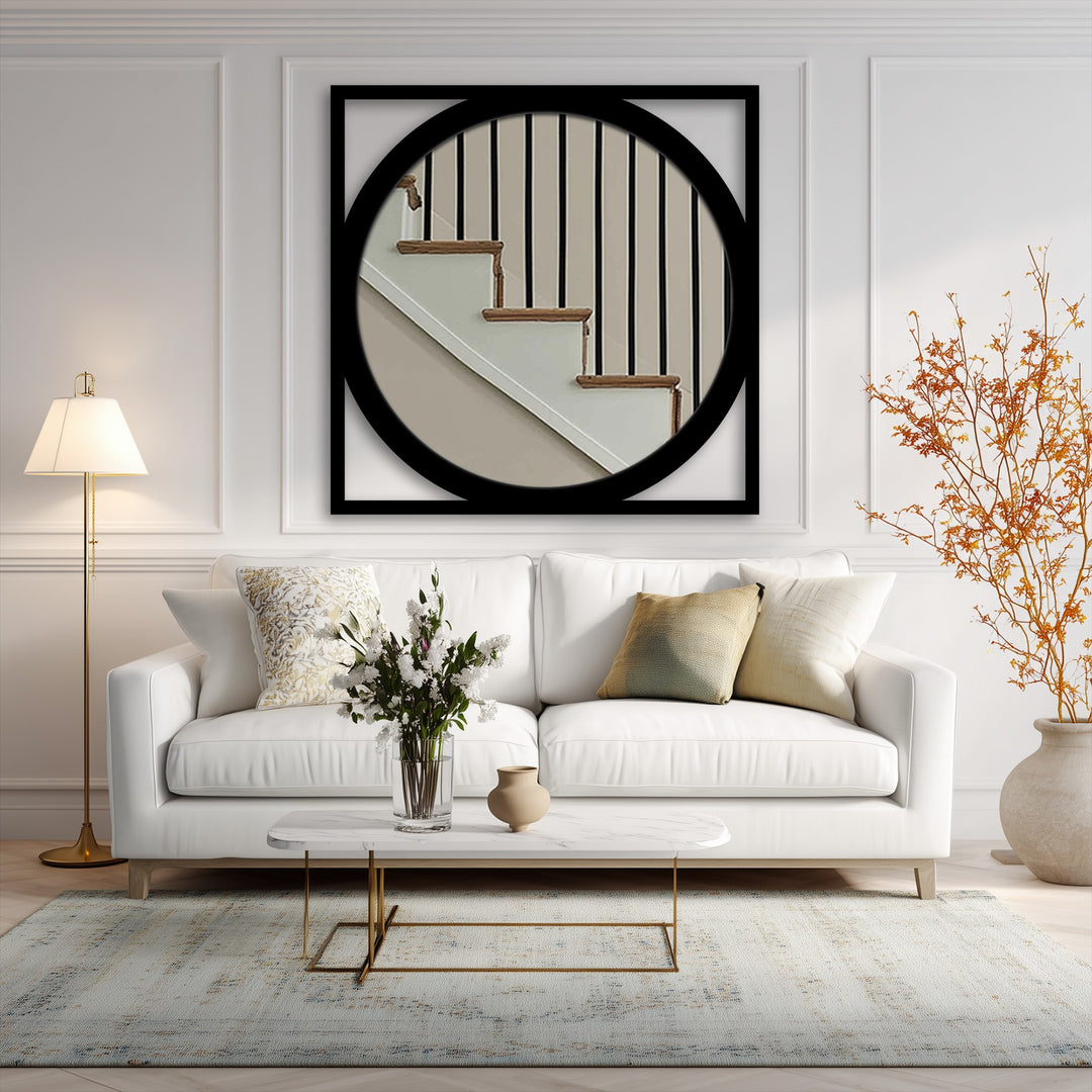 Aesthetically pleasing, the geometric black metal frame mirror for wall decor adds an elegant touch, enhancing the serene mood of this modern living space.