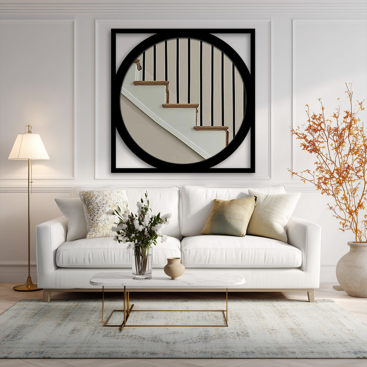 Aesthetically pleasing, the geometric black metal frame mirror for wall decor adds an elegant touch, enhancing the serene mood of this modern living space.