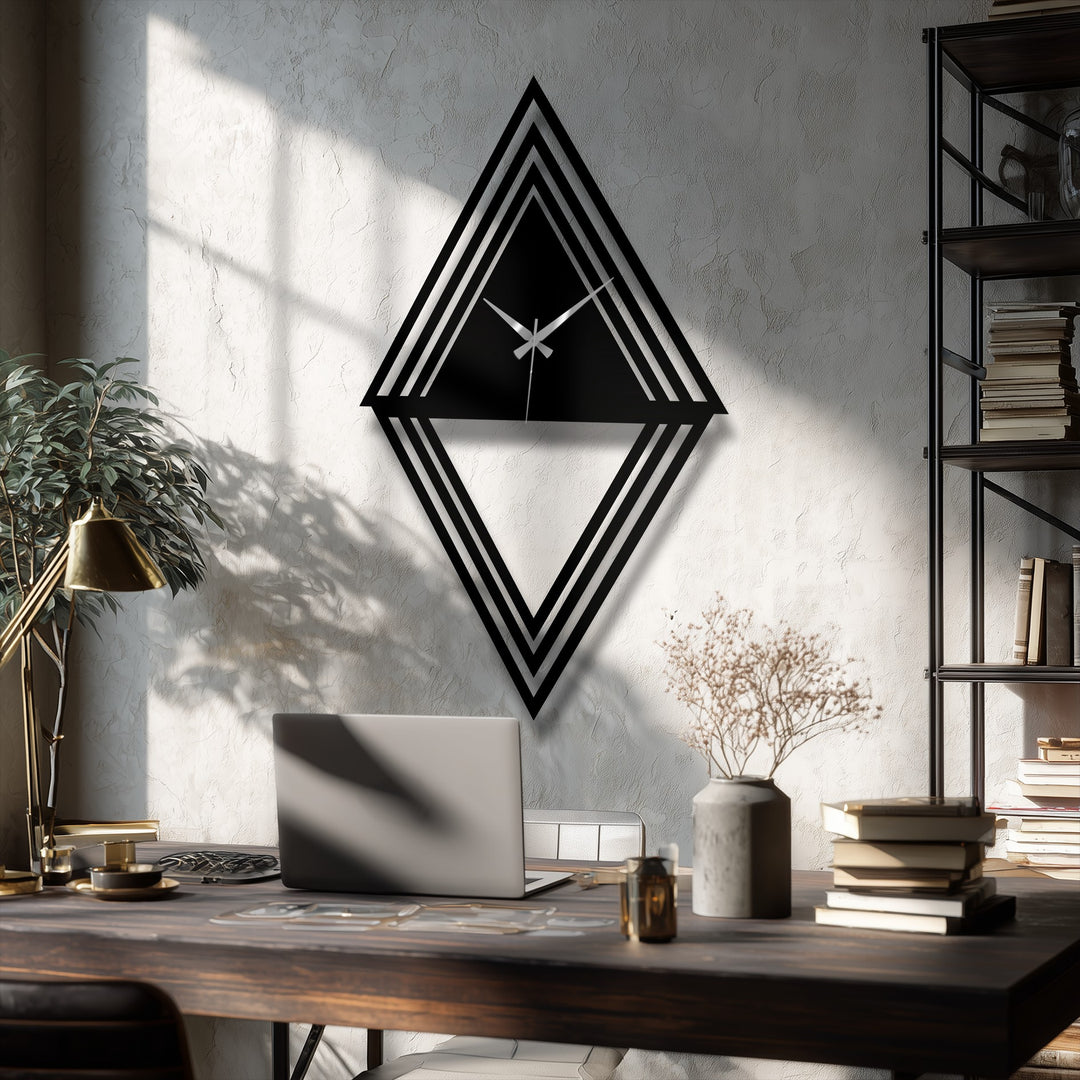 Layered diamond design of the geometric metal wall decor clock creates a striking focal point in the modern interior setting.