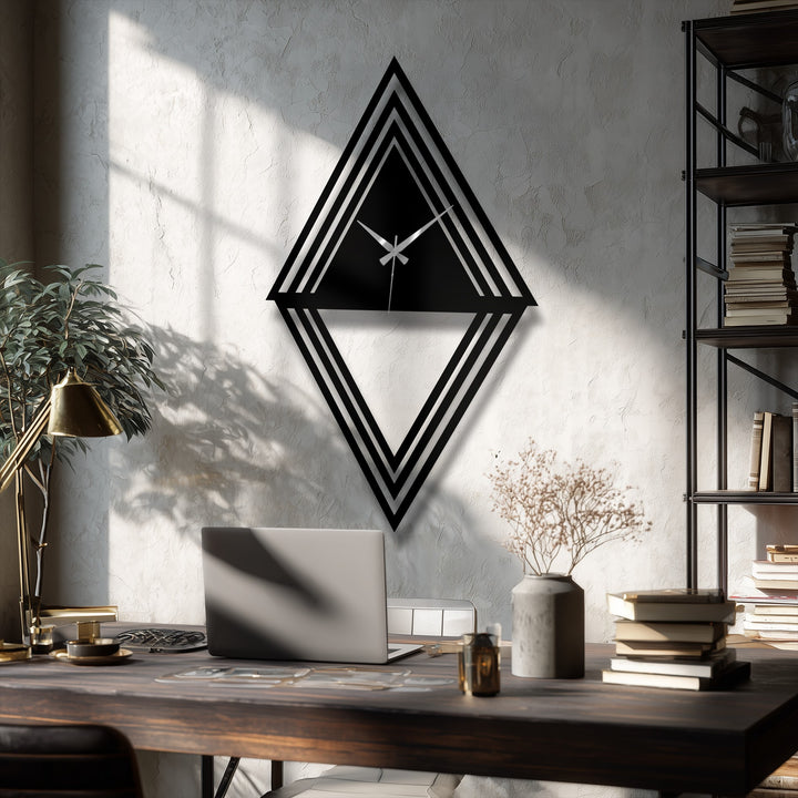 Layered diamond design of the geometric metal wall decor clock creates a striking focal point in the modern interior setting.